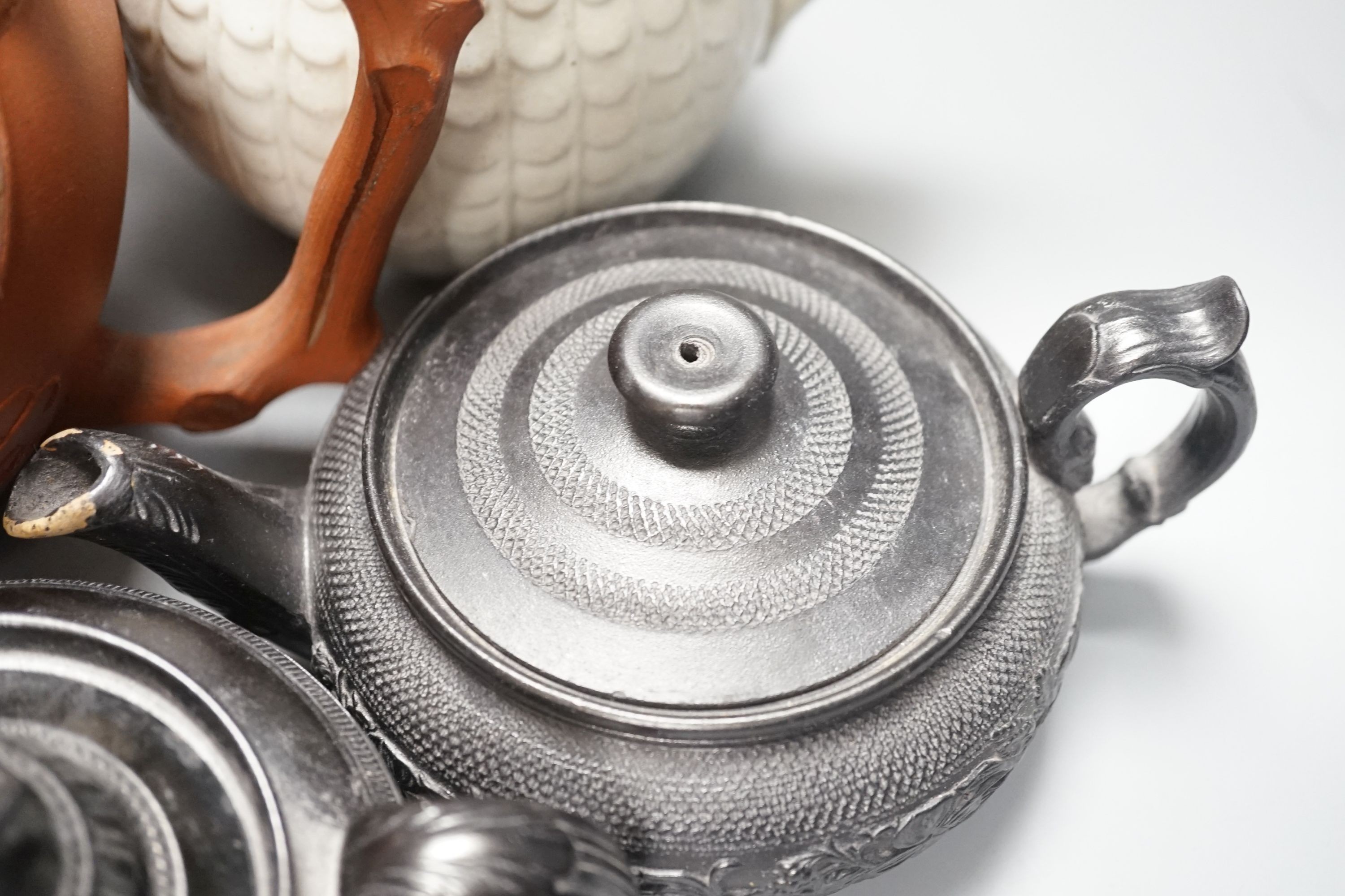 Four 19th century black basalt or black glazed pottery teapots, a large red ware teapot, a creamware dish and a Royal Worcester pot pourri, and other ceramics, tallest 27.5cm